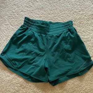 Lulu lemon Teal high waisted Hotty Hots 4in seam size 4